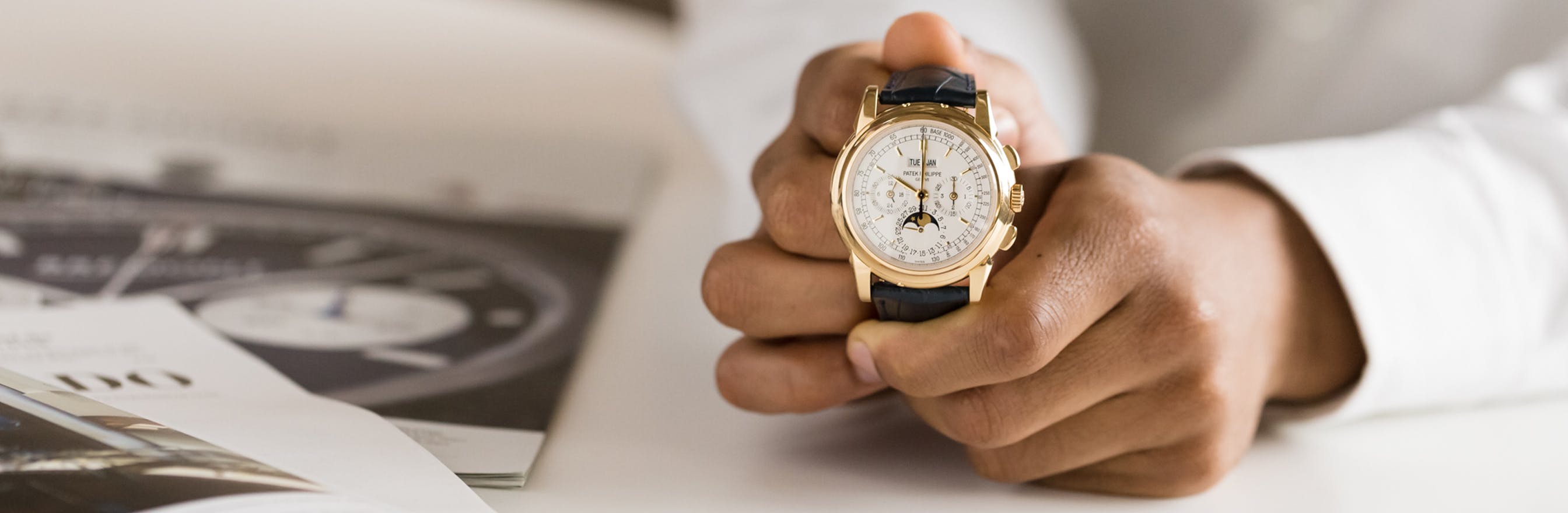 person holding watch